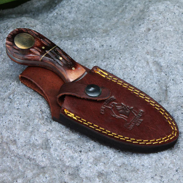 CUCHILLO 7" BONE COLLECTOR CON MANGO DE HUESO Y GANCHO PARA DESTRIPAR