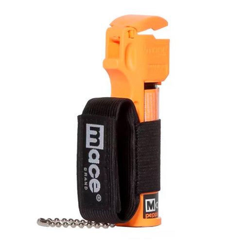 Gas pimienta Mace Jogger Naranja con sujetador elástico y tapa abatible