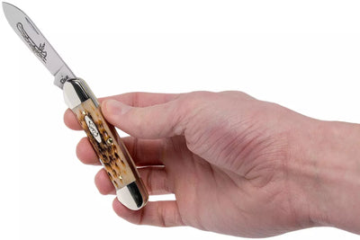 NAVAJA CASE AMBER BONE CANOE